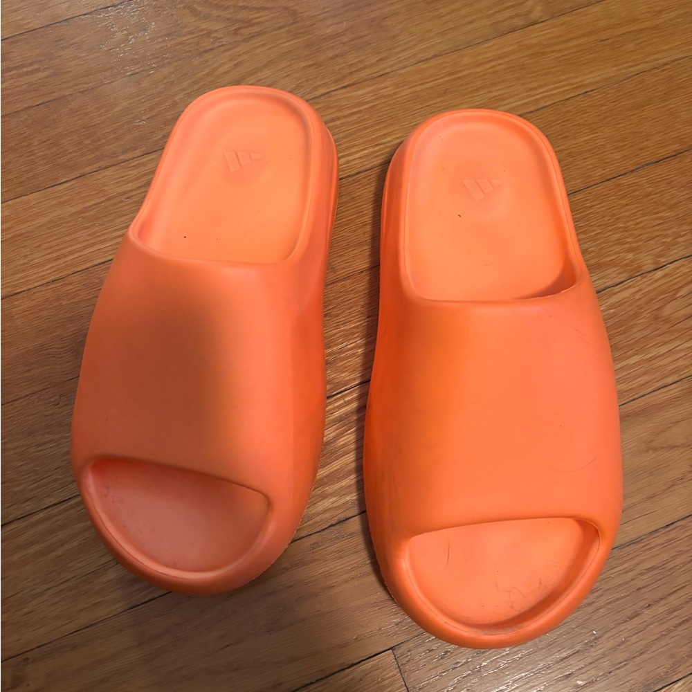 orange yeezy slides